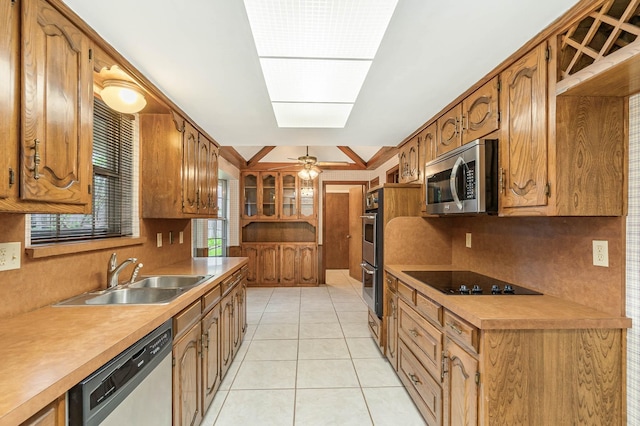 kitchen with ceiling fan, light tile patterned floors, sink, backsplash, and appliances with stainless steel finishes