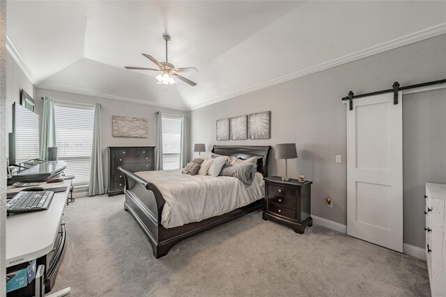 bedroom featuring baseboards, a barn door, light colored carpet, and crown molding