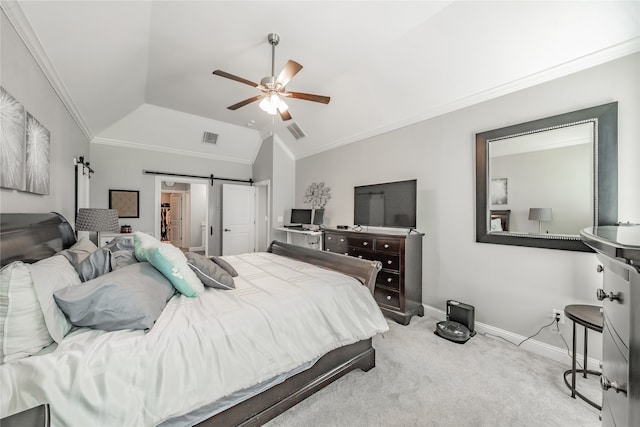 carpeted bedroom featuring ornamental molding, lofted ceiling, a barn door, and ceiling fan