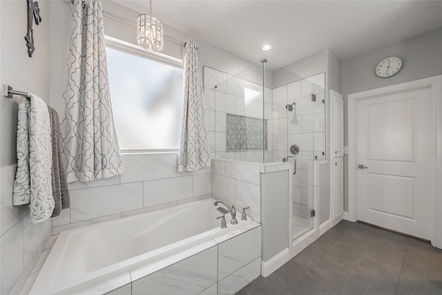 full bath with a bath, a shower stall, and tile patterned floors