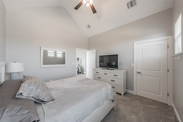 bedroom with high vaulted ceiling, light colored carpet, and ceiling fan