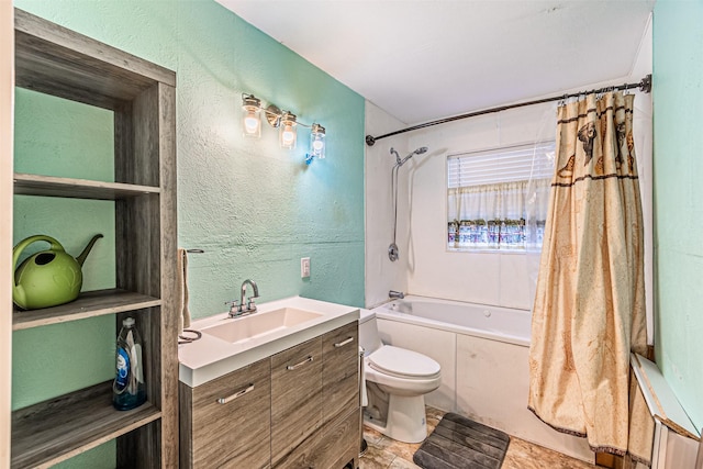 full bathroom with toilet, vanity, and shower / tub combo