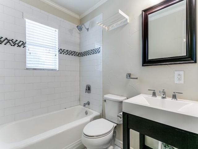 full bathroom with crown molding, vanity, toilet, and tiled shower / bath combo