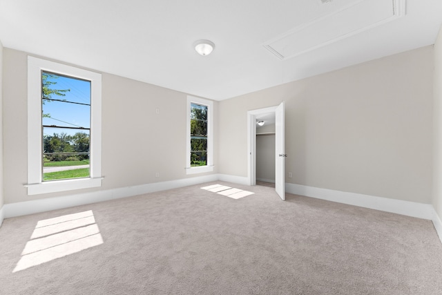 unfurnished living room featuring hardwood / wood-style flooring and ceiling fan