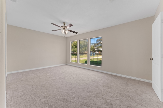 unfurnished bedroom with light carpet and a closet