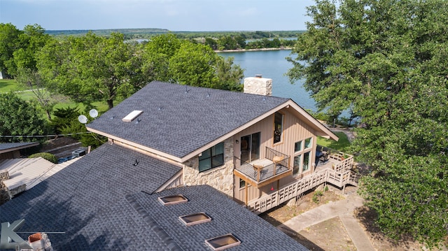 drone / aerial view with a water view