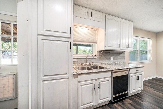 kitchen with white cabinetry, pendant lighting, dark hardwood / wood-style floors, and dishwasher