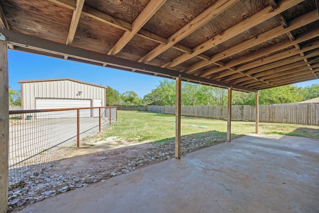 view of patio / terrace with an outbuilding