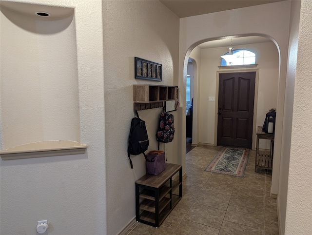 entryway with tile patterned floors