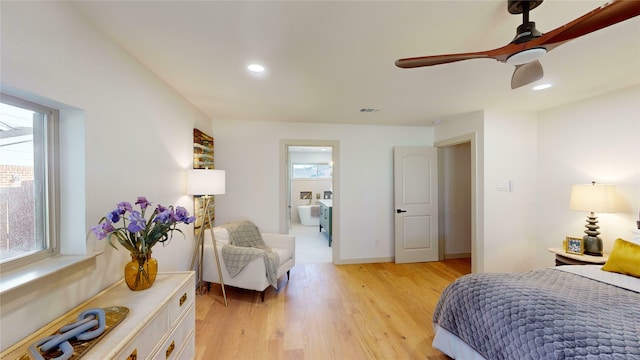 bedroom with recessed lighting, multiple windows, and light wood-style floors