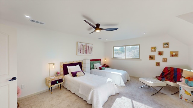 carpeted bedroom featuring vaulted ceiling and ceiling fan