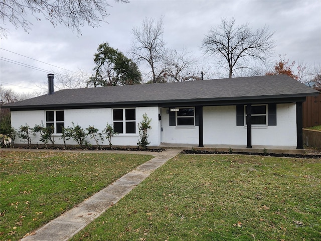 ranch-style house with a front yard