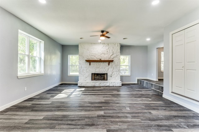 kitchen with decorative backsplash, appliances with stainless steel finishes, dark hardwood / wood-style flooring, sink, and white cabinetry