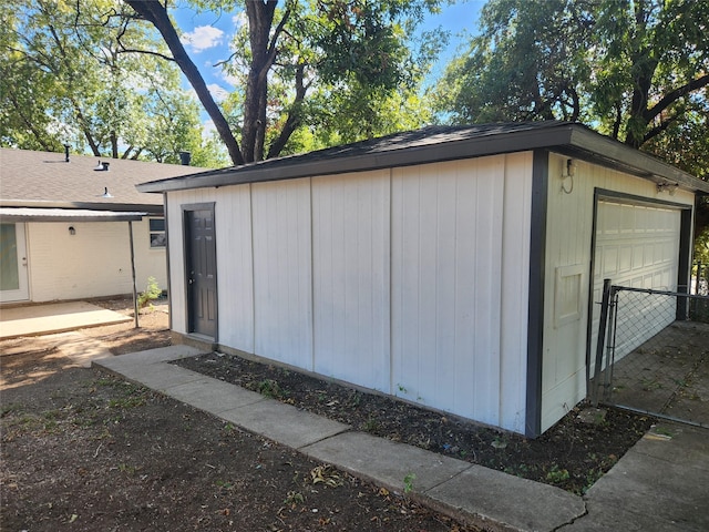 view of outbuilding featuring a garage