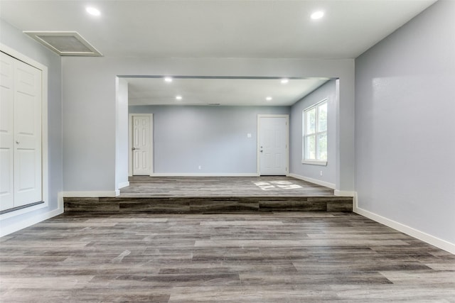 kitchen with white cabinetry, sink, tasteful backsplash, dark hardwood / wood-style flooring, and appliances with stainless steel finishes