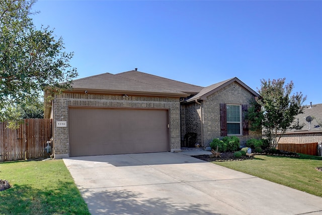 ranch-style house with a garage and a front lawn