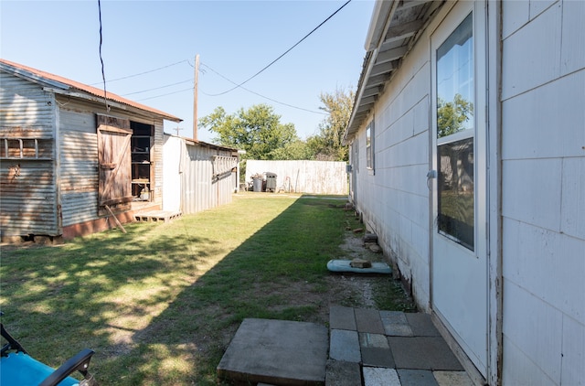 view of yard with a storage shed