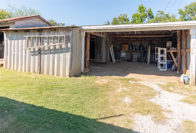 view of outdoor structure with a yard