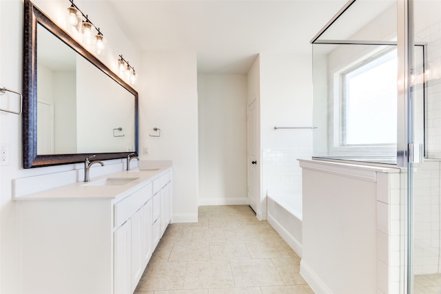 bathroom featuring vanity, plus walk in shower, and tile patterned floors