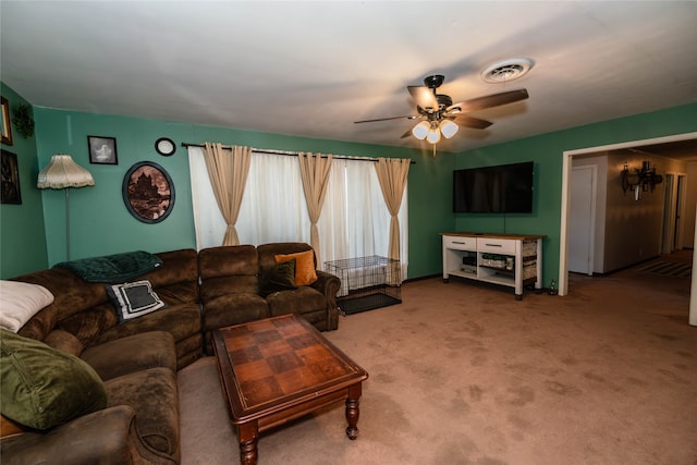 living room featuring carpet flooring and ceiling fan