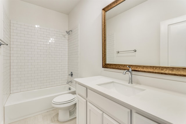 full bathroom with shower / washtub combination, vanity, and toilet