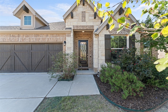 view of front of home with a garage