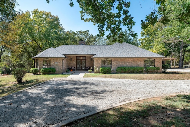 ranch-style house featuring covered porch