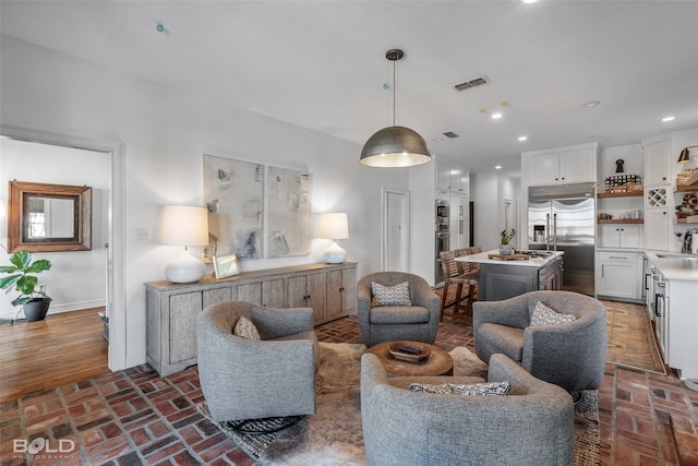 living room featuring sink