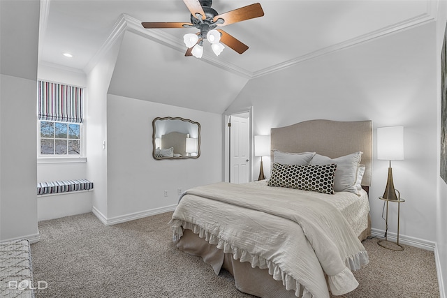 carpeted bedroom with ornamental molding, vaulted ceiling, and ceiling fan