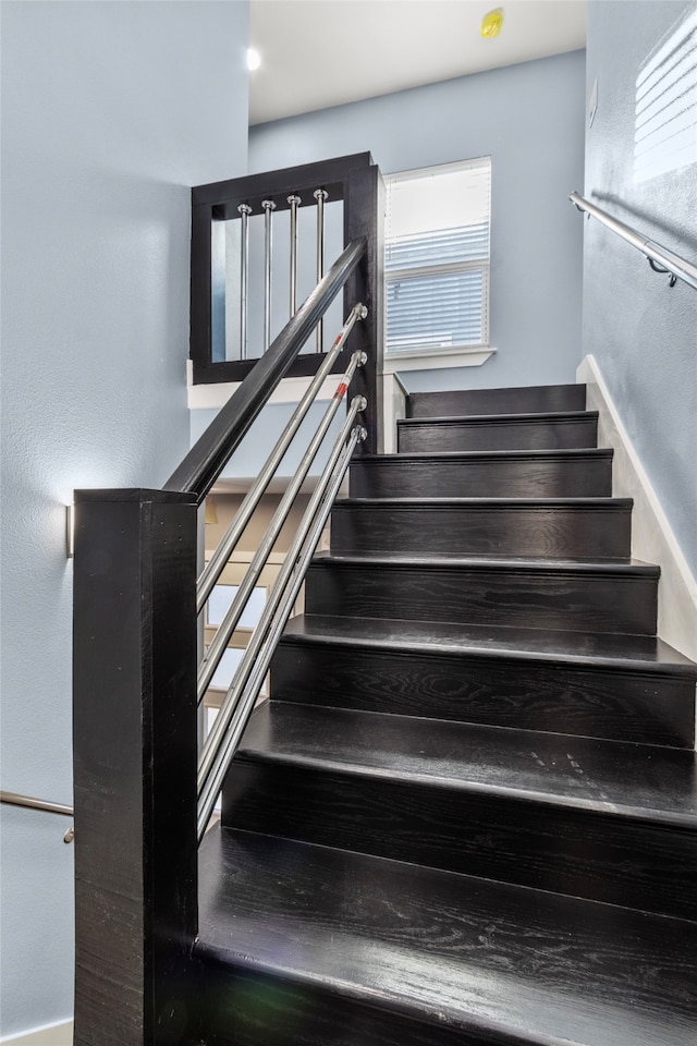 stairs with a wealth of natural light