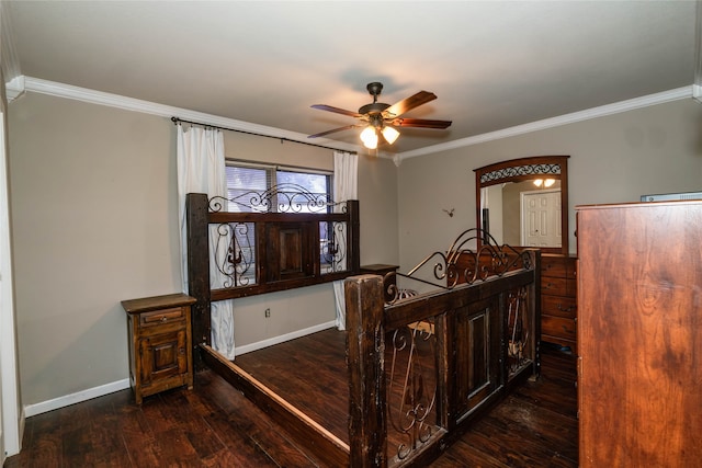 bedroom with crown molding, dark hardwood / wood-style floors, and ceiling fan