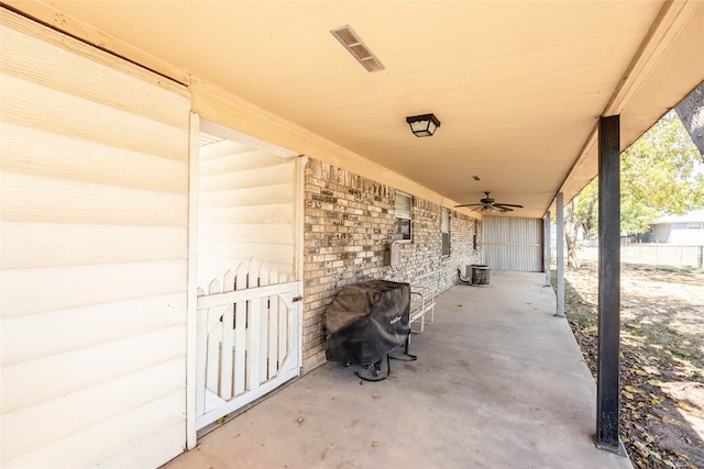 view of patio / terrace featuring ceiling fan