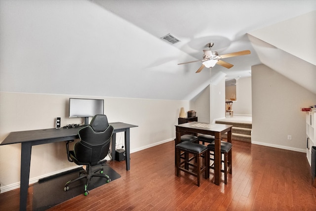 office space featuring lofted ceiling, dark hardwood / wood-style flooring, and ceiling fan