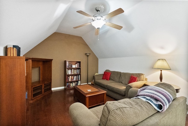 living room with vaulted ceiling, ceiling fan, and dark wood-type flooring