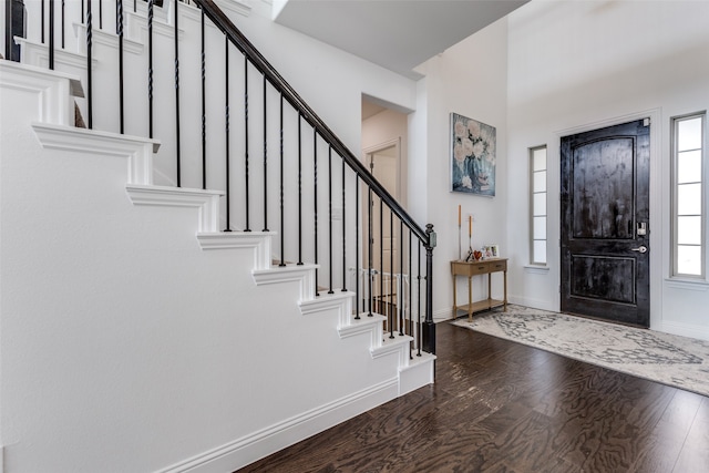 foyer entrance featuring hardwood / wood-style flooring