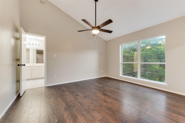 unfurnished room featuring ceiling fan, high vaulted ceiling, and dark wood-type flooring