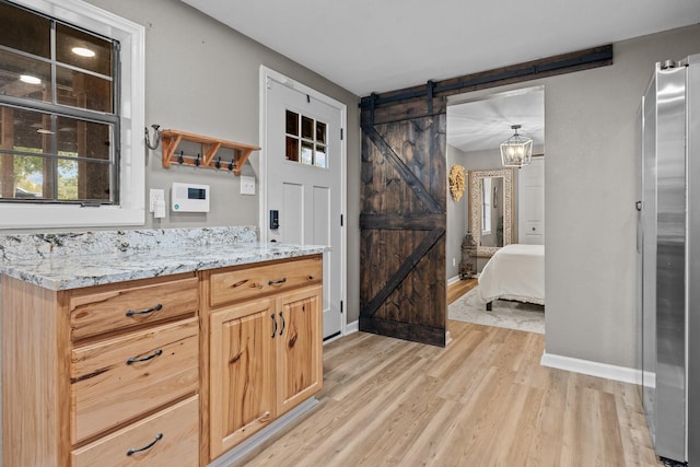 bathroom featuring vanity and hardwood / wood-style floors