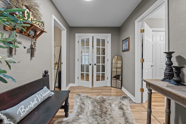 full bathroom with hardwood / wood-style flooring, vanity, shower / bath combination with curtain, and toilet