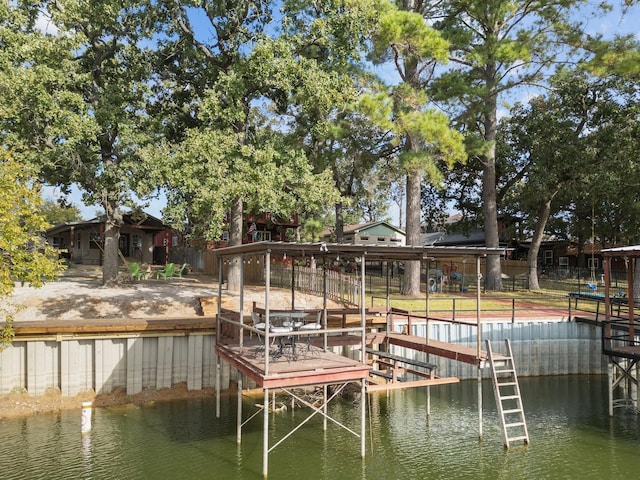 dock area featuring a water view