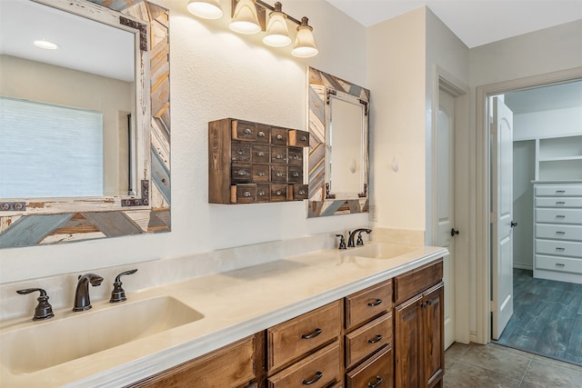 bathroom with vanity and hardwood / wood-style flooring