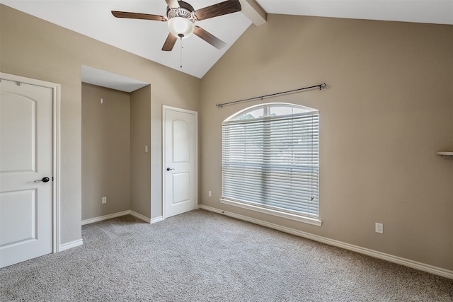 unfurnished bedroom with light carpet, vaulted ceiling with beams, and ceiling fan