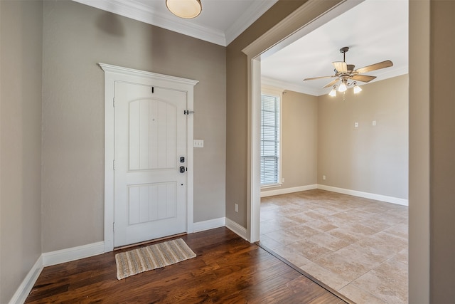 entrance foyer with ceiling fan, light wood-type flooring, and crown molding