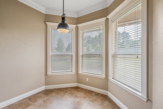 tiled empty room featuring ornamental molding