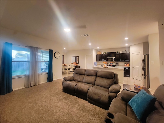 living room featuring light colored carpet