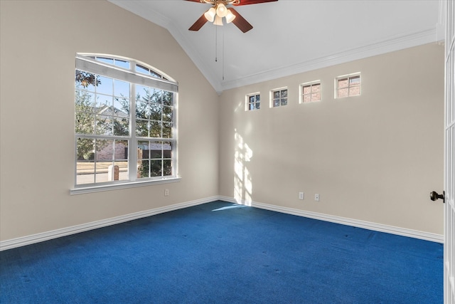 empty room with crown molding, lofted ceiling, dark carpet, and plenty of natural light