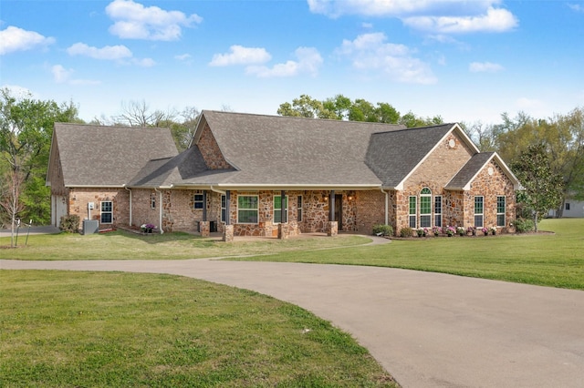 view of front of home with a front yard