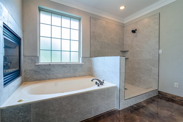 bathroom with shower with separate bathtub and ornamental molding