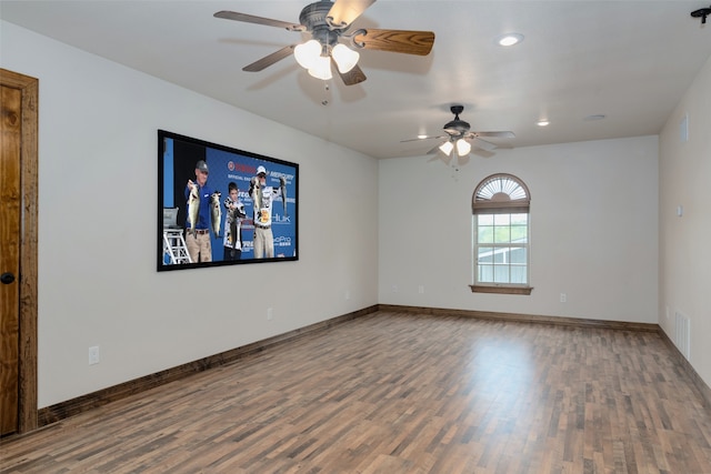 spare room with dark hardwood / wood-style floors