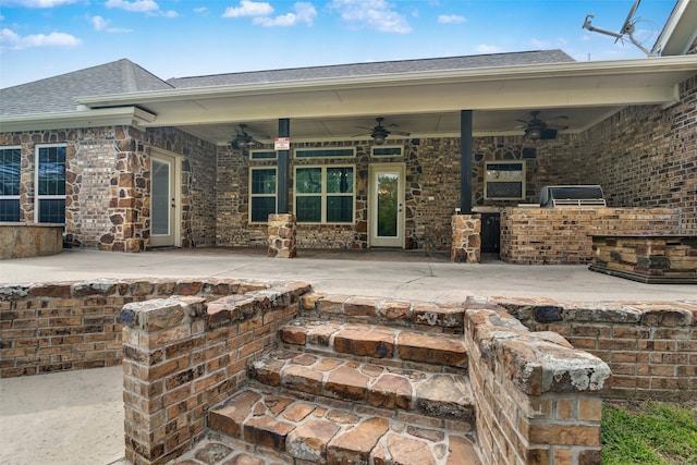 exterior space with ceiling fan and area for grilling