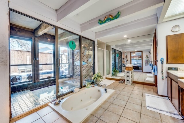 bathroom featuring tile patterned flooring, vanity, beam ceiling, and plus walk in shower